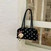 Bolsa de poá de nicho transfronteiriça para mulheres, nova bolsa versátil simples de ombro/sob o braço para o outono de 2026, bolsa de mão de moda retrô