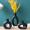 Vaso Decorativo de Escritorio Artístico Simple al por Mayor Negro Redondo Cerámica Forma de Rosquilla