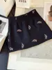 Falda corta de lana con lentejuelas de moda estilo coreano para mujer, nueva falda corta de línea A anti-exposición de otoño para mujeres petite