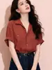 Camisa de manga corta con solapa estilo lino de alta gama y elegante, con un ambiente veraniego relajado, diseño holgado y top único de botones.