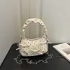 Bolso de mano informal de moda coreana, simple, con lunares, nuevo 2026, nicho, bandolera versátil y elegante para mujer