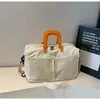 Set de bolsas de viaje de mano transfronterizo, maleta de ruedas, bolsa de equipaje plegable, separación funcional de seco y húmedo, bolsa para natación y fitness
