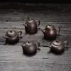 Mango de tetera de punta de dedo pieza de arena púrpura tetera pequeña olla de punta de dedo juego de té de kung fu té exquisito para los dedos mesa de té mini