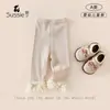 Pantalones de encaje nuevos para niña, primavera 2026, leggings de color liso, pantalones largos de moda para niñas, pantalones lindos y versátiles para niños
