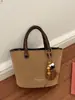 Bolso tipo cubo de estilo retro para mujer, nueva colección otoño 2026, bolso de hombro simple y casual con diseño coreano