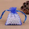 Bolsa de hilo para joyería al por mayor de fábrica color liso hilo de perla bolsa para dulces de boda empaque de joyería color liso bolsa de malla de gasa organza