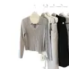 Contiene 33% lana, Guangzhou Trece Líneas imis*2026 Otoño Cuello Polo Adelgazante Manga Larga Top de Punto para Mujer
