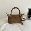 Bolso de axila para mujer Retro 2026 Nueva Moda Diseño de nicho para mujer Más vendido Bolso de hombro único bandolera Bolso de mano Moderno