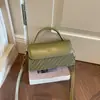 Bolso pequeño cuadrado elegante Shuai Mi Jia modelo nuevo 2026 bolso simple de moda de un solo hombro cruzado bolso casual para mujer de axila