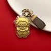 Llavero de Oveja Pequeña para Ahorrar Dinero de Año Nuevo 2027, un artículo promocional para eventos de aniversario de tiendas, un colgante dorado y un regalo conmemorativo de Año Nuevo