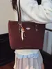 Bolsa Transfronteriza de Gran Capacidad para Mujer Modelo Nuevo 2026 Bolso de Hombro para Estudiante Universitario Bolso Tote Versátil de Moda para Viajes