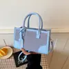 Bolsa feminina de grande capacidade, nova moda casual de verão 2026, bolsa de ombro, bolsa para aula de estudante universitário, bolsa quadrada pequena para o dia a dia