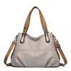 Bolsa modelo novo Vintage 2026 com padrão de lichia, bolsa tote feminina de grande capacidade, versátil e prática, adequada para usar no ombro ou na transversal