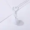 Llavero de aleación con forma de corazón y bola de felpa de colores, accesorio de bolsa DIY hecho a mano, pequeño regalo para parejas y amigos