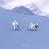 Pendientes de botón de plata pura s999 estrella de ocho puntas moda femenina lujo ligero pendientes de estrella nicho blanco y negro circón incrustado perforación de oreja