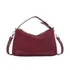 Bolso de mano casual retro para mujer, nuevo modelo otoño 2026, bolso versátil de hombro y cruzado elegante de alta calidad