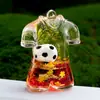 Llavero de Arena Líquida Acrílica al por Mayor Creativo Tema Copa del Mundo Balón de Fútbol Botella de Arena Líquida Colgante Decoración Directo del Fabricante