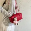 Bolsa de Axila Coreana de Nicho Feminina 2026 Nova Simples Versátil Bolsa Boston Almofada Grande Capacidade de Mão Ombro