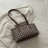 Bolso de mano elegante y versátil para mujer, nueva colección 2026, moderno y chic, adecuado para ir al trabajo, bolso de hombro, diseño de lunares, se puede llevar debajo del brazo
