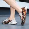 Zapatos de Agujero de Coco de EVA Camuflados Famosos de Internet para Hombres y Mujeres Verano Kanye Wear Zapatos de Suela Gruesa con Graffiti