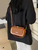 Bolso tipo caja retro de lujo ligero de comercio exterior de alta gama para mujer, nuevo bolso de mano de moda 2026, bolso pequeño cuadrado para hombro y cruzado