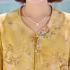 Ropa de verano estilo chino nueva para madres, camisa cárdigan estilo tradicional, nuevo modelo 2026, camisa de verano de moda para mujeres de mediana edad y mayores