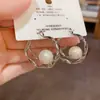 Pendientes de Metal Irregulares con Perlas, Moda Personalizada Europea y Americana, Pendientes Femeninos de Diseño Simple, Estilo Fresco al por Mayor