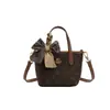 2026 Nueva Bolsa Cesta de Verduras de Lujo Ligero con Monograma Bolso de Mano con Estampado de Nicho para Mujer Bolso de Hombro Bolso Cruzado de Aspecto de Alta Gama
