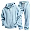 Conjunto de dos piezas para hombre de estilo europeo y americano, tejido gofre liso, manga larga y pantalón largo, un atuendo casual simple y versátil.