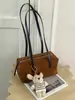 Bolso de hombro Shuai Mi Home 2026 de gran capacidad, un bolso de mano elegante y único con un diseño retro y minimalista, perfecto para llevar debajo del brazo.