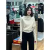 ¡Llegó! Nuevo diseño de invierno, estilo nicho, cuello medio alto, cuello con volantes, suéter de punto, top de punto interior para mujer, otoño