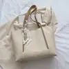 Bolso tote de gran capacidad para mujer para exportación, nuevo bolso de hombro casual primavera/verano 2026, bolso tote retro europeo y americano para el día a día
