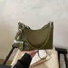 Bolsa de Ombro com Textura Trançada de Nicho para Mulheres 2026 Nova Tendência de Verão Toque de Luxo Bolsa de Ombro Único Transversal para o Trabalho