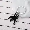 Chaveiro de gato frito de aço inoxidável com design criativo transfronteiriço, acessórios fofos de desenho animado para mochila, atacado