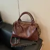 Bolsas de Venta Caliente Transfronterizas para Mujer Bolso de Mano Retro de Cuero Suave Bolso de Almacenamiento Casual para Viajes Bolso de Hombro Cruzado de Gran Capacidad