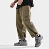 Mono de trabajo de color sólido vintage estilo Hong Kong para hombre, holgado, pierna ancha, versátil, pantalones rectos, pantalones casuales cropped fluidos estilo japonés