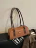 Bolsa de textura luxo leve feminina 2026 verão nova tendência bolsa de ombro único transversal bolsa de mão retro Boston bolsa feminina fashion