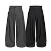 Pantalones casuales plisados de estilo americano para calle, fluidos, con diseños de moda, bolsillos únicos, color liso y corte holgado de pierna ancha para hombre.