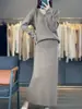 Outono/Inverno 2026 Novo Conjunto de Duas Peças Feminino: Suéter de Tricô Gola V Liso 100% Lã Manga Longa com Saia Longa de Cintura Alta