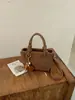 Bolso tipo cubo de tejido de alta gama para mujer, nuevo y elegante, estilo verano chic, de un solo hombro y cruzado