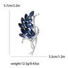 Broche de cristal de aleación de diamante azul tinta, broche de oro rosa y diamantes de imitación blancos K, suministro directo de fábrica.