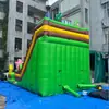 Tobogán inflable con temática de dinosaurios de la jungla, diseño simulado de planta verde, fábrica de equipos inflables de entretenimiento comercial para exteriores