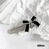 Pinza para el cabello Estilo Frío Explosivo Ins Dulce Metal Lazo Diseño de Nicho Distintivo Sentido de Diseño Lujo Ligero Pinza Lateral Accesorios para el Cabello para Mujeres