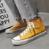 Tênis Casuais de Cano Alto em Lona para Casais Estilo Coreano Versátil Tênis de Skate para Estudantes Estilo Casal Masculino Produto Triplamente Vulcanizado