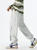 Nuevos pantalones joggers casuales de otoño para hombre, holgados, pantalones largos modernos y versátiles para hombres jóvenes, pantalones de chándal elegantes