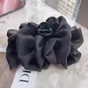 Pinza para el pelo de malla negra atmosférica con forma de lazo, pinza de tiburón grande para la parte trasera de la cabeza, nuevo estilo 2025 para mujer
