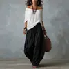 2026 Conjunto de mujer transfronterizo europeo y americano Amazon TK nuevo top largo holgado de hombros descubiertos + pantalones de campana