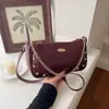 Comercio exterior cadena artística tachonada única nueva vintage ligera de moda bandolera hombro baguette pequeño cuadrado para mujer