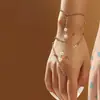 Estilo nacional bohemio cadena de metal multicapa cuentas redondas costura cadena para el dedo diseño estilo playa pulsera sexy de celebridad de internet