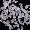 Accesorios para joyería DIY Yiwu joyería pequeña al por mayor varios modelos aretes tapones para los oídos tapones de plástico para los oídos
